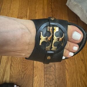 Tory Burch Black Leather Mules with Gold Emblem 8M